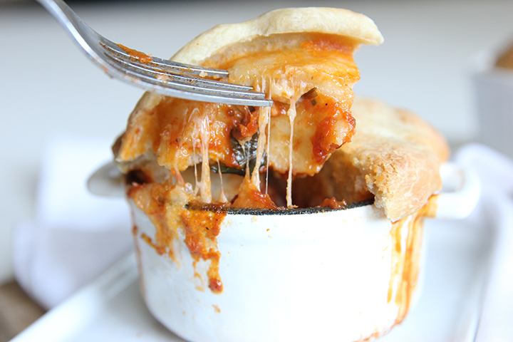 A twist on your regular pizza - meatball marinara pizza pot pie! Gooey goodness, no pizza cutter required, and easily customized with your favorite ingredients.