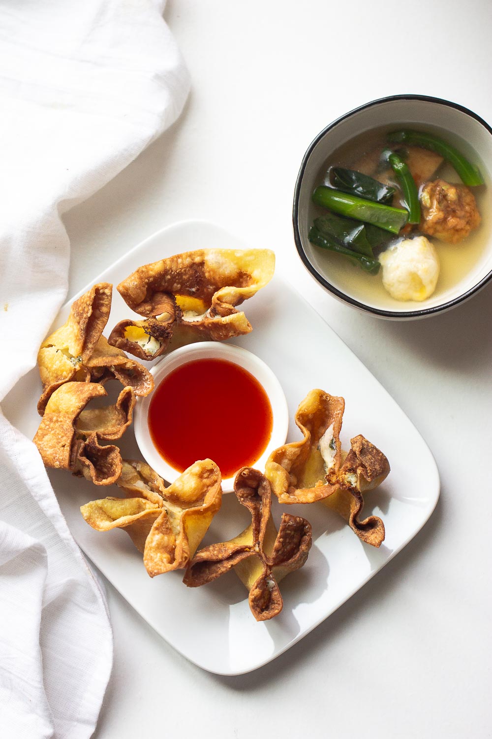 These creamy cream cheese and crab rangoons are so easy to make at home. A fake-out take-out favorite and perfect for snacking on game days!