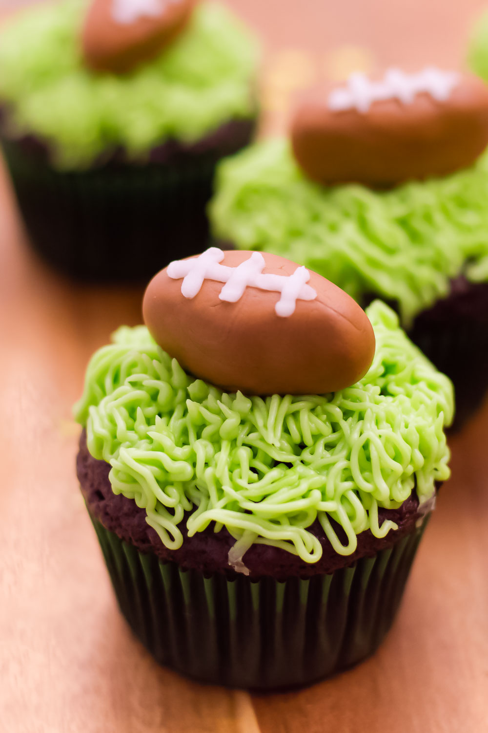 Football Cupcakes are the perfect dessert for Super Bowl parties, football game day, or a themed football birthday party!