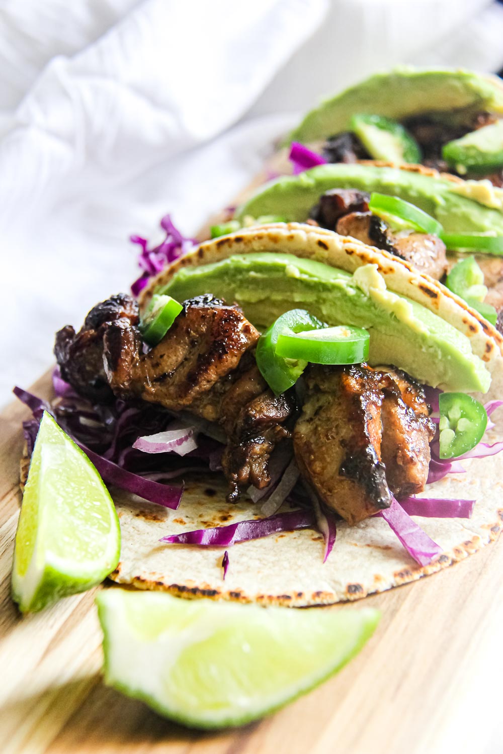 Kick your Taco Tuesday or Cinco de Mayo up a notch with these pineapple lime chicken tacos that are hearty and full of flavors!