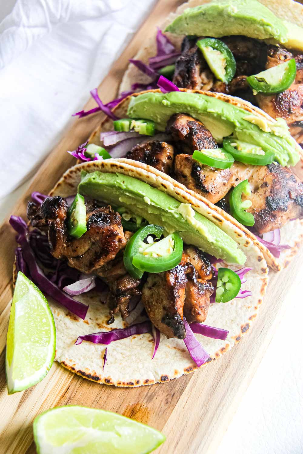 Kick your Taco Tuesday or Cinco de Mayo up a notch with these pineapple lime chicken tacos that are hearty and full of flavors!