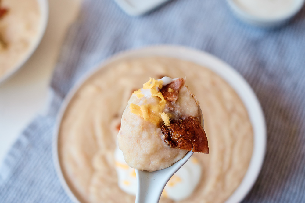 This Baked Potato & Cauliflower Soup has a thick and creamy broth that's loaded with onion and bacon. It is the definition of comfort food that also makes a delicious winter-warmer soup.