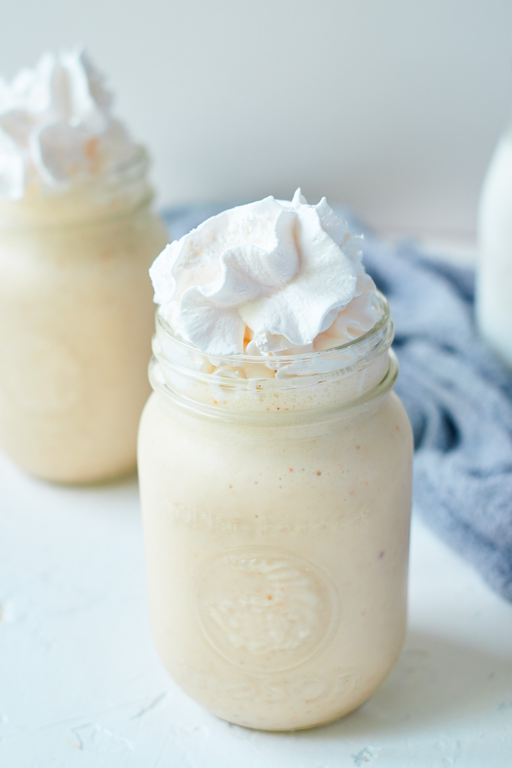 Pecan Pie Milkshake - a boozy milkshake with bourbon, butter pecan ice cream, and almond milk! A delicious spin of your Thanksgiving dessert that can be ready in 5 minutes! It can easily be doubled, tripled, or even quadrupled to satisfy a group and comes together in minutes — perfection! 