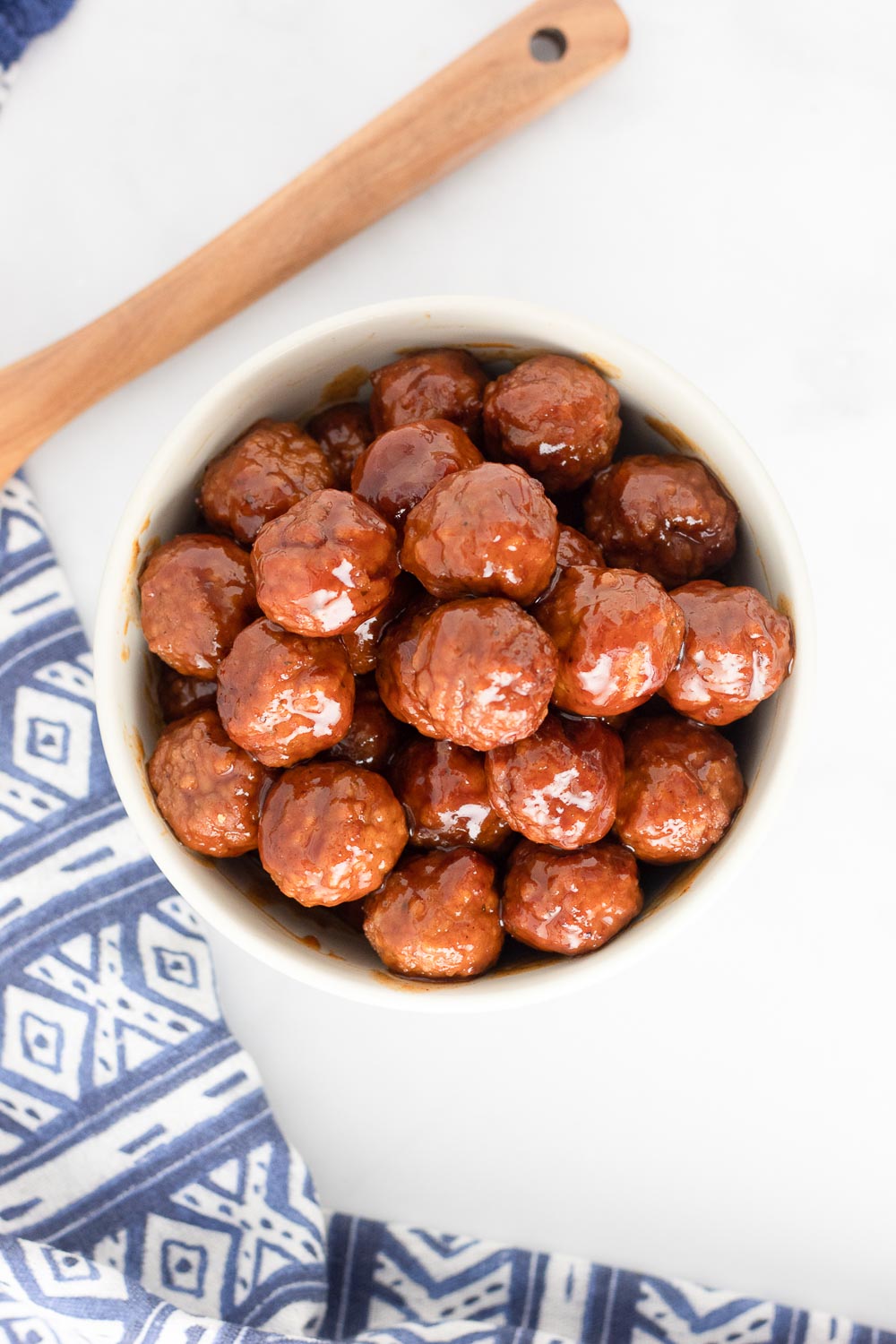 Sticky, a touch spicy, juicy and so tasty! These Slow Cooker Party Meatballs make the perfect party appetizer or quick family dinner.