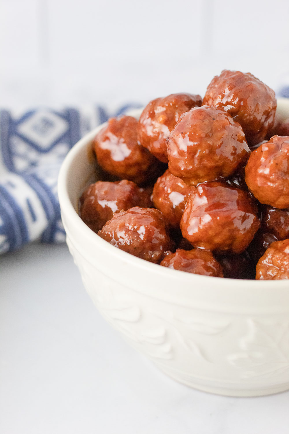 Sticky, a touch spicy, juicy and so tasty! These Slow Cooker Party Meatballs make the perfect party appetizer or quick family dinner.