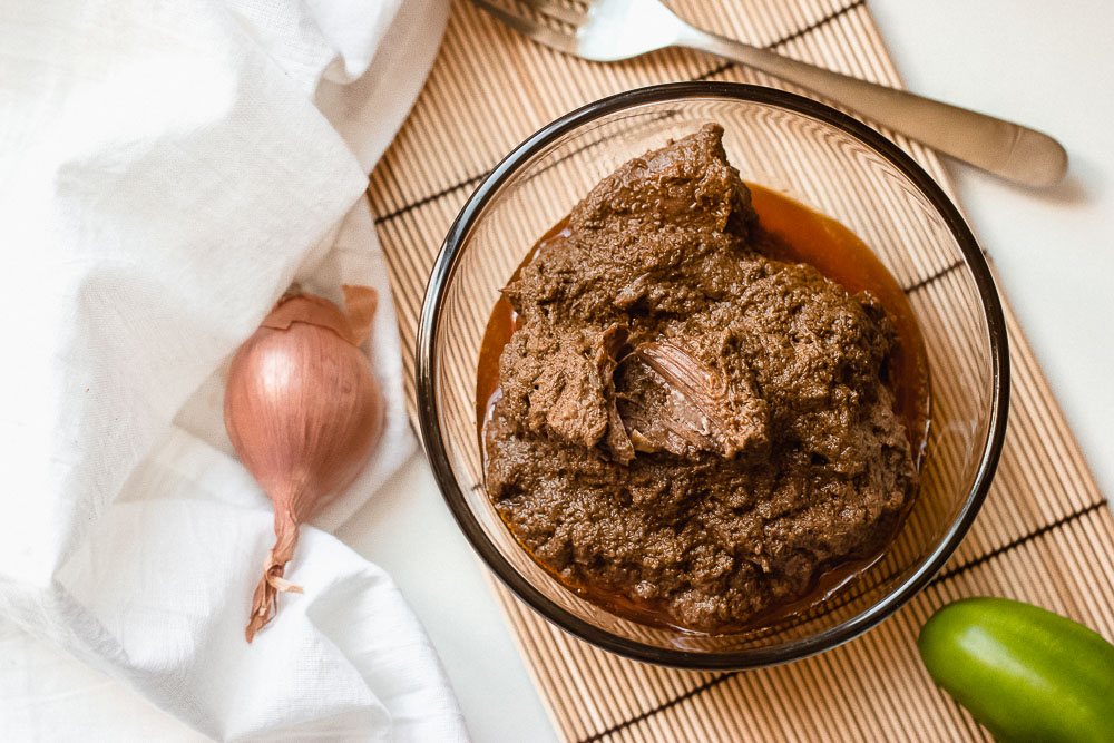 Easy recipe for Indonesian Beef Rendang! Each piece is caramelized on the outside, tender on the inside & smothered in a thick, rich, caramelized aromatic curry sauce. Make this Beef Rendang so you can have a taste of the Best Food in the World! 