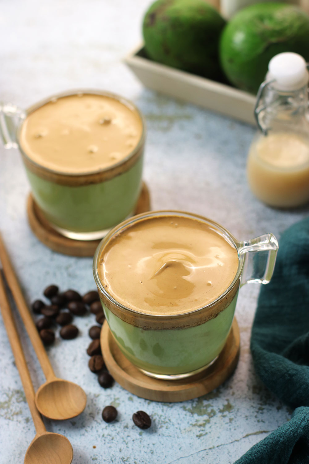 Creamy Avocado Dalgona Coffee is absolutely irresistible and a great way to make your morning coffee super special. The creamy fluffy sits on top of the avocado smoothie makes a great brunch drink. or an afternoon pick-me-up.