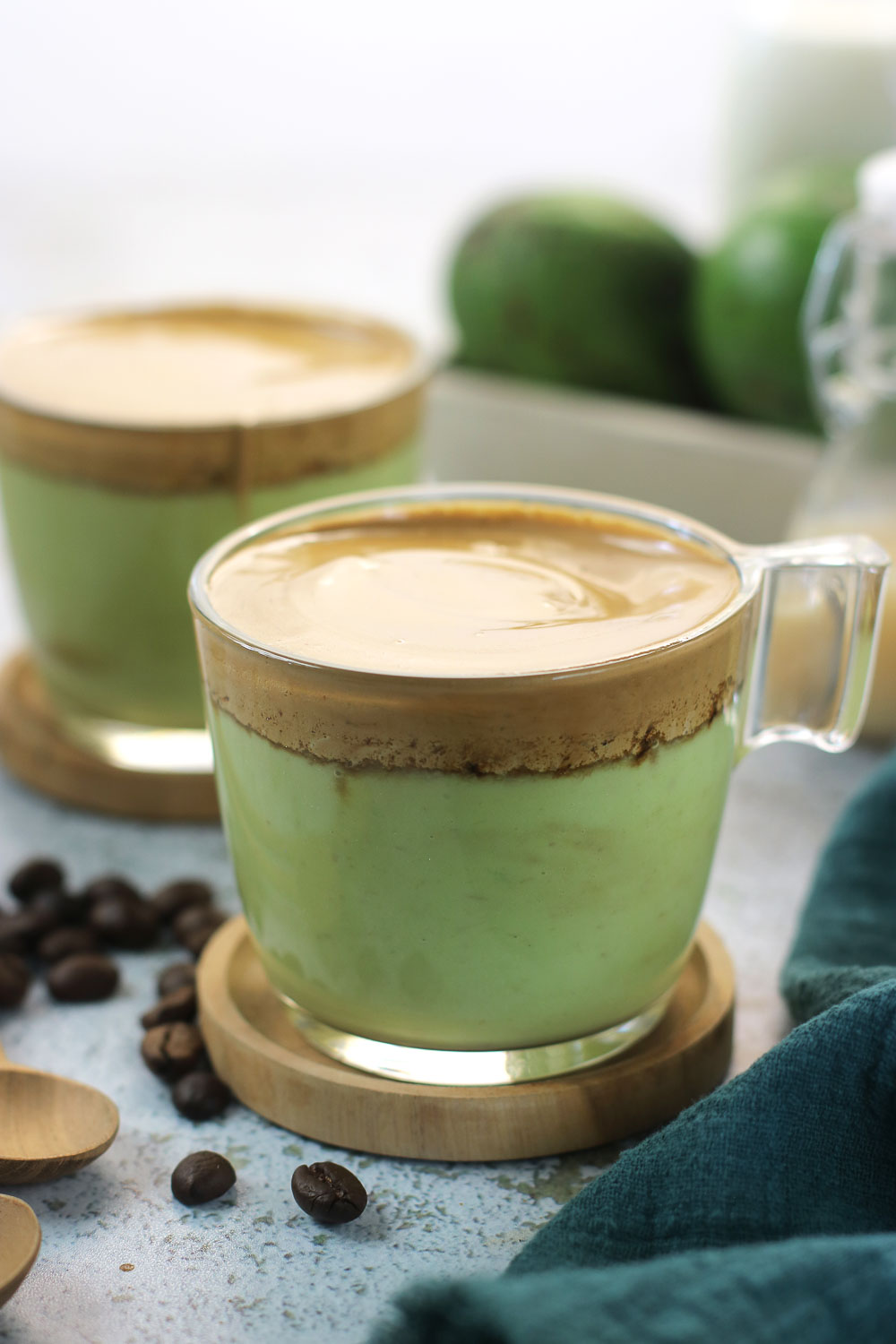 Creamy Avocado Dalgona Coffee is absolutely irresistible and a great way to make your morning coffee super special. The creamy fluffy sits on top of the avocado smoothie makes a great brunch drink. or an afternoon pick-me-up.