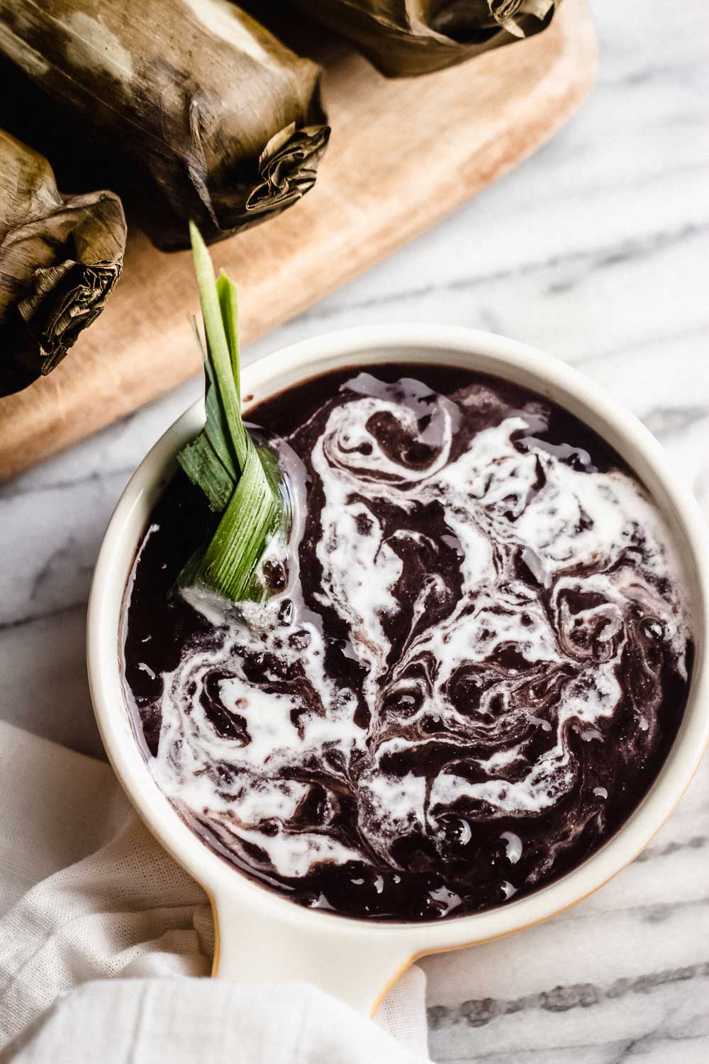 This bubur ketan hitam (glutinous black rice sweet porridge) recipe is perfect for breakfast or a snack. Light and delicious made with black glutinous rice and coconut milk, plus healthy, packed full of iron, protein, and antioxidants!