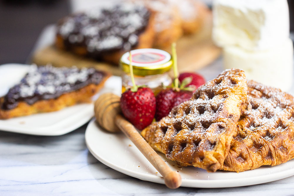 Do you like croissants? Do you like waffles? Then you need these easy croissant waffles. This croissant sandwich takes leftover croissants 10 times better. Plus, they're freezer-friendly, too!