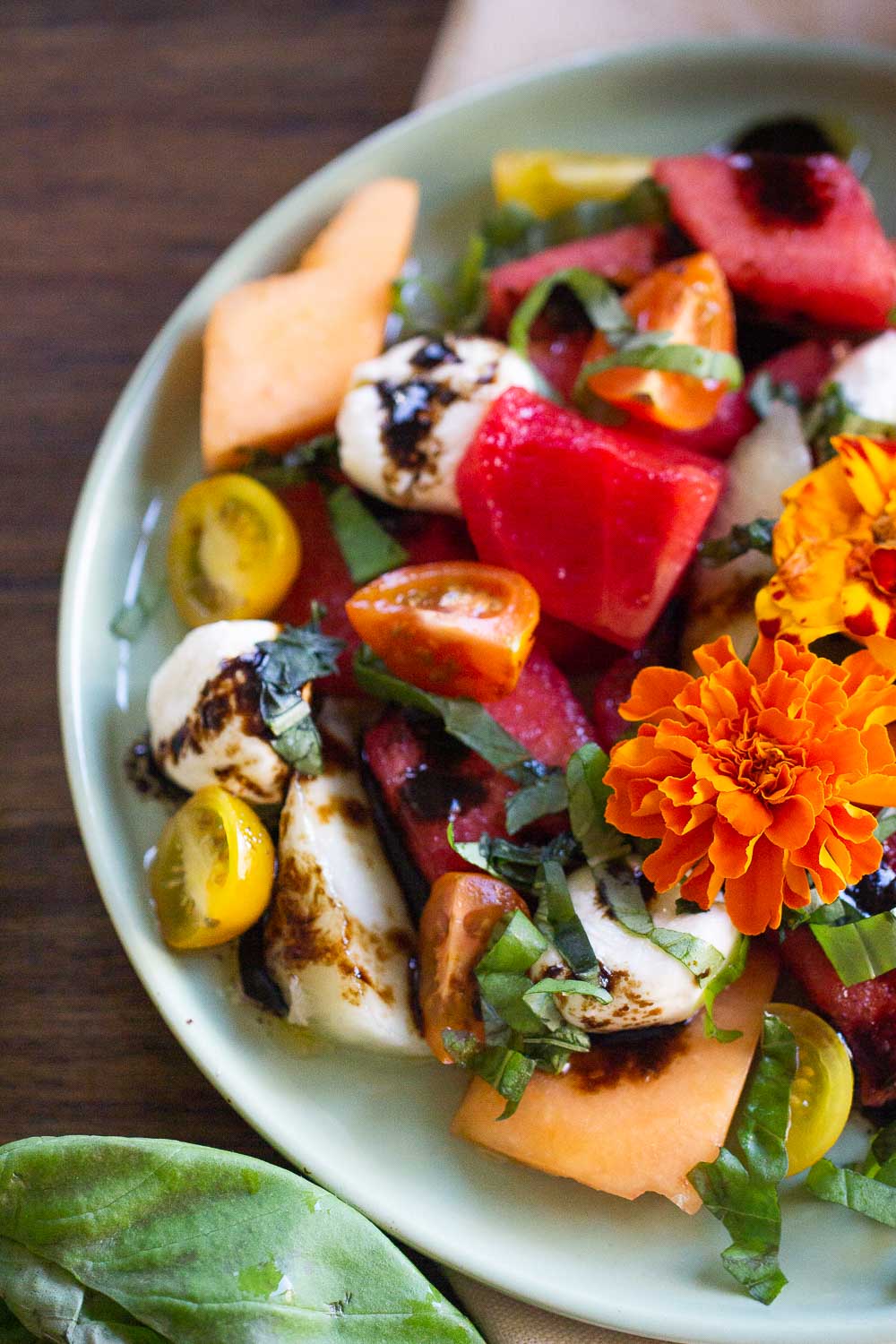 Bring sunshine to your plate with this Watermelon Caprese Salad. A light and refreshing salad that is full of different textures and flavors.