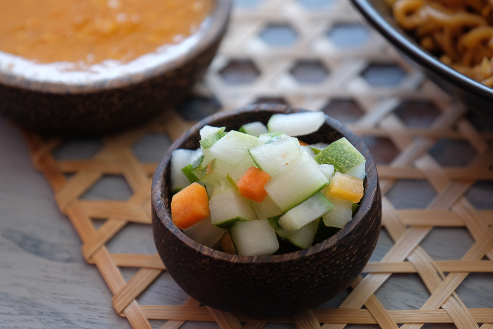 Acar timun (Indonesian pickle) is part of condiments that accompanies many dishes from fried rice to meat dishes. Spicy, sweet, and sour!