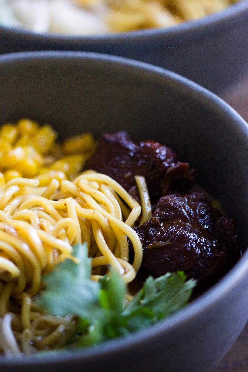 Simple and hearty, this crockpot caramelized pork noodle soup is classic fall comfort food. It is SO good that you’ll want to slurp up the whole bowl right away.