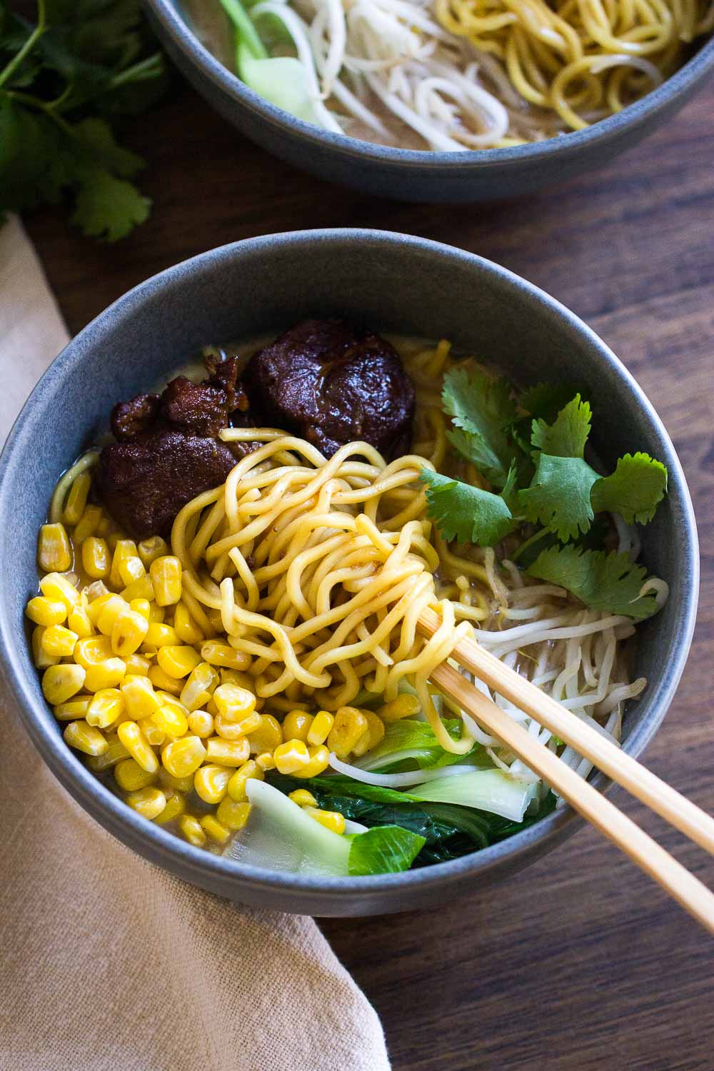 Simple and hearty, this crockpot caramelized pork noodle soup is classic fall comfort food. It is SO good that you’ll want to slurp up the whole bowl right away.