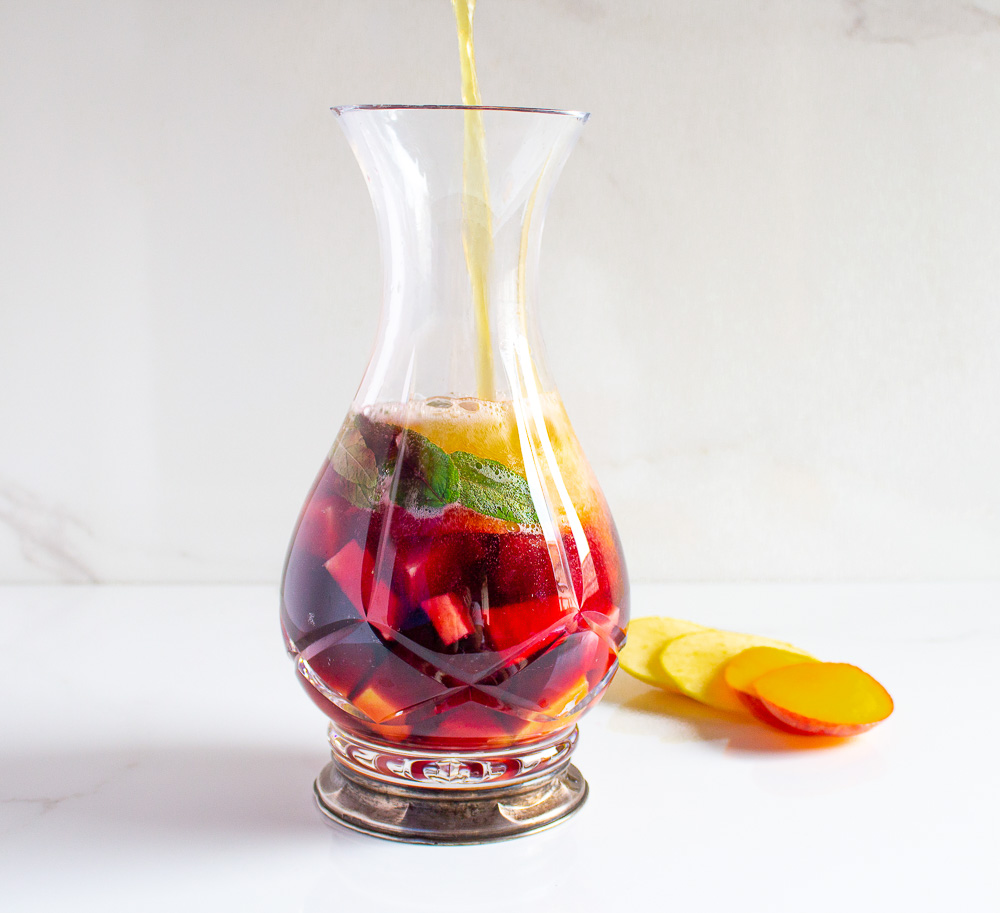 Try this easy refreshing Halloween sangria for your Halloween party. This refreshing sangria recipe maximizes the fruit content and red wine that also makes the perfect drink you should be sipping on this fall.