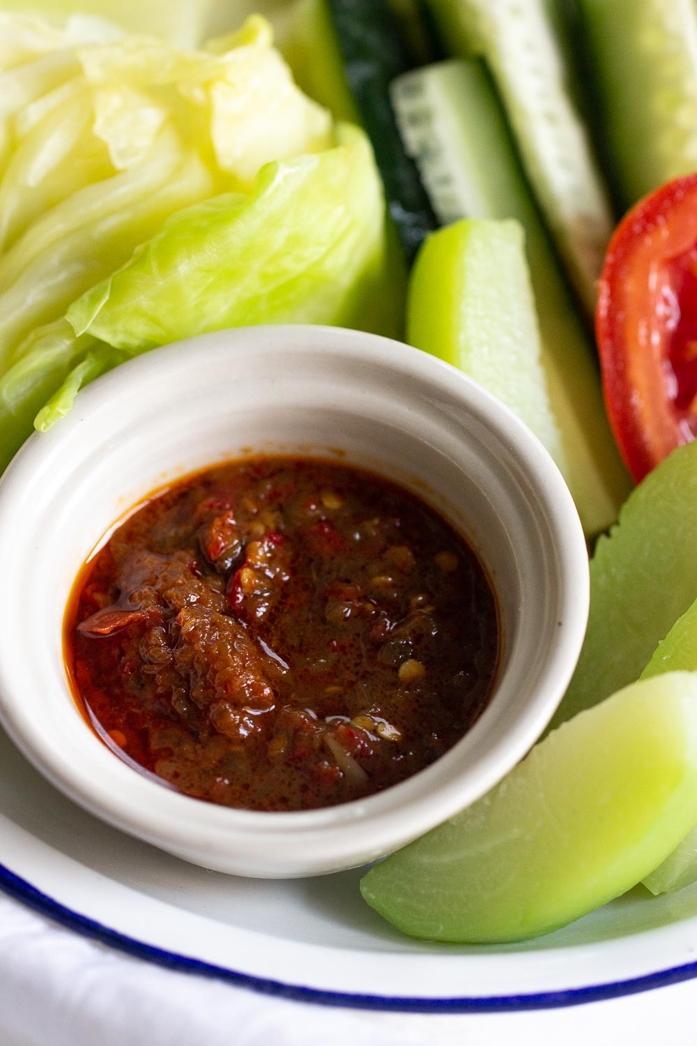 If you're a fan of something spicy, you need to try sambal terasi. Also known as sambal belacan, this spicy condiment is very popular and pairs well with fried chicken or lalapan.