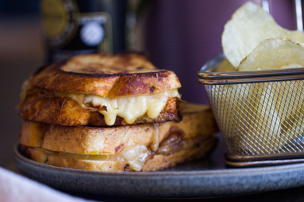 French Onion Grilled Cheese Sandwich with melty Gruyere and caramelized onions make the best comfort food. It has all the flavors of a classic French onion soup, but quicker to make and portable! Your taste buds will swoon!