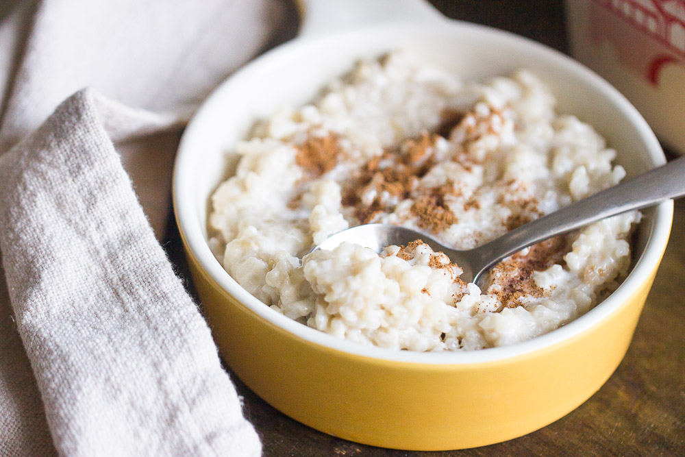 Easy rice pudding using leftover cooked rice is so creamy comforting, and it’s the perfect way to use up that leftover rice. It takes 5 ingredients and less than 30 minutes to make this sweet comfort food.