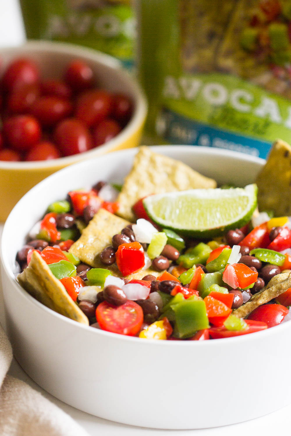 This no-cook black bean salad is always a crowd-pleasure and makes the perfect side dish for lots of different meals! Ready in less than 10 minutes, you can serve this recipe as a dip, over your favorite grilled protein or fish, or serve it as a salad!