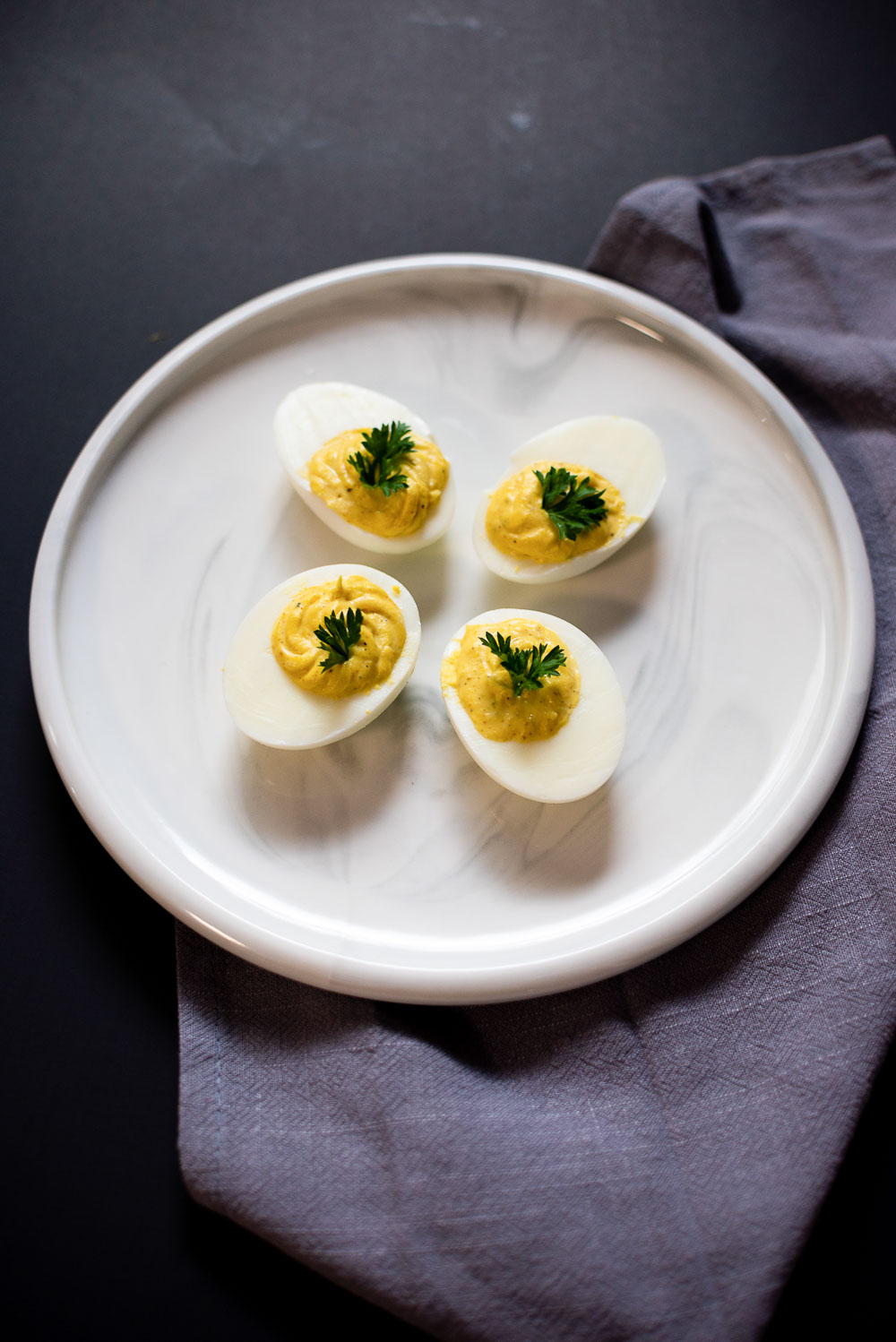 A hint of curry gives an unusual twist to these classic deviled eggs.