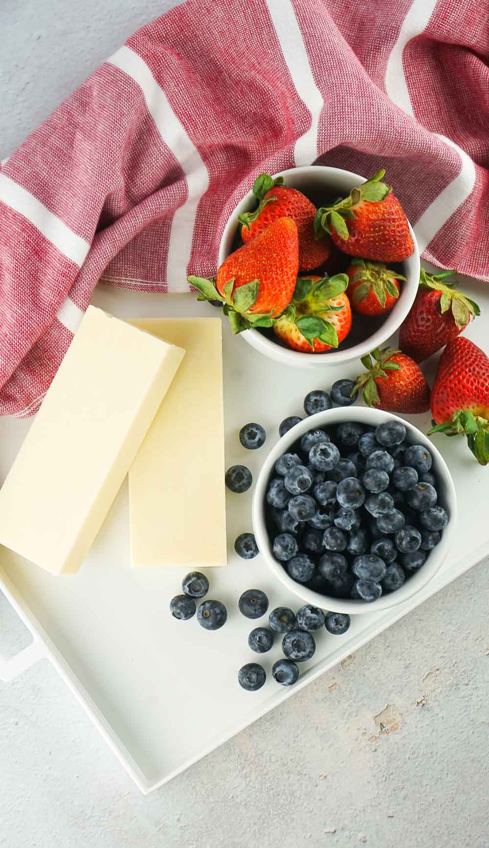 Make red white blue cheese board, a gorgeous fruit and cheese platter that screams patriotic. Deliciously juicy blueberries and strawberries pair with white cheddar, or the white cheese of your choice to make the ultimate snack platter for your get-together.