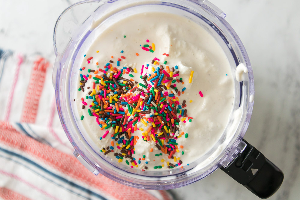 This homemade vanilla bean funfetti milkshake is refreshing, easy to make, and makes a delicious summer drink! Learn how to make this colorful sprinkle milkshake with simple ingredients and ready in 5 minutes.