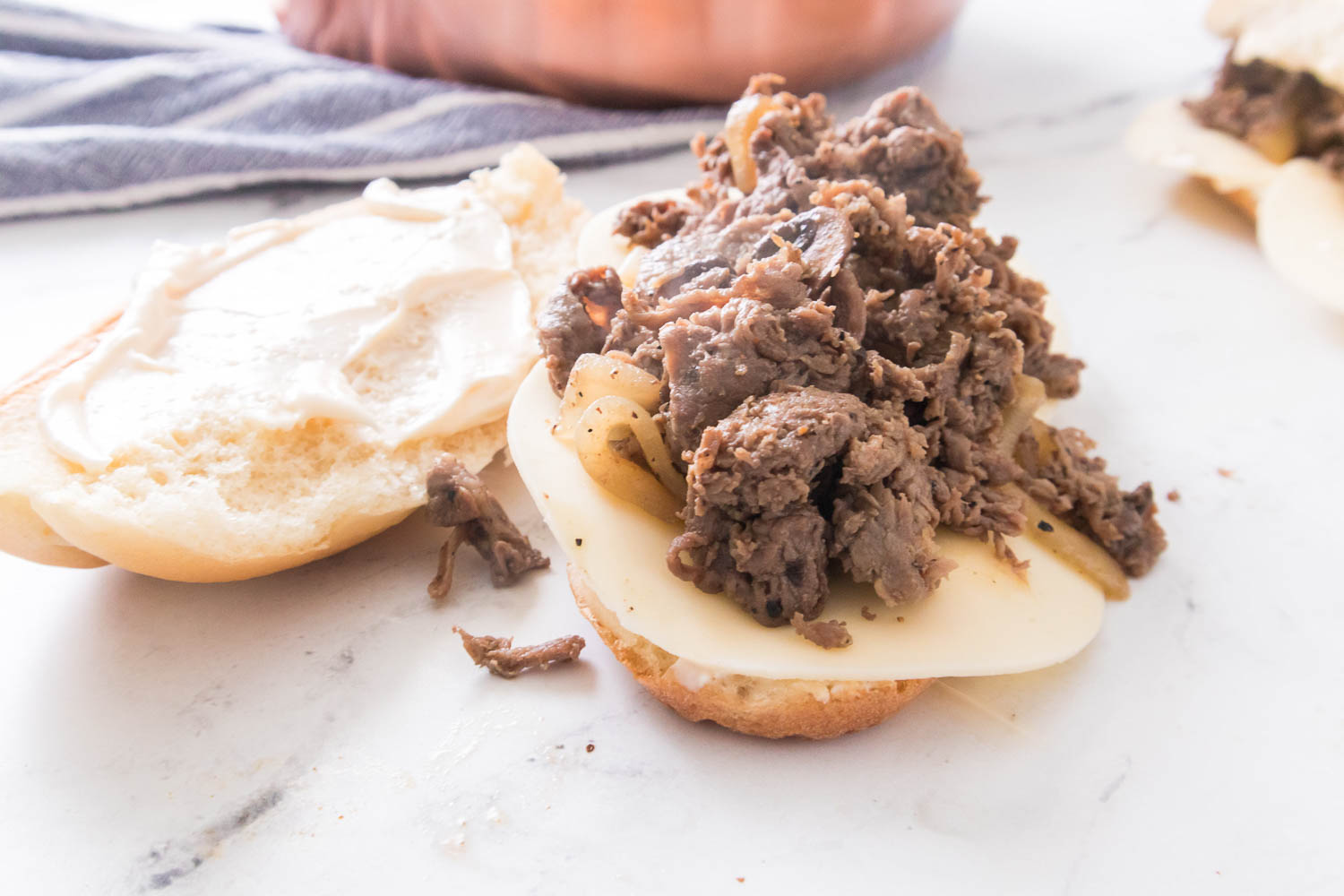 There's nothing quite like a Philly cheesesteak. Thin slices of steak, melted cheese, and onions grilled to perfection on a fresh roll- it doesn't get much better than that. And while you can find variations of this sandwich all over the country, there's really nothing quite like the real thing from Philadelphia.