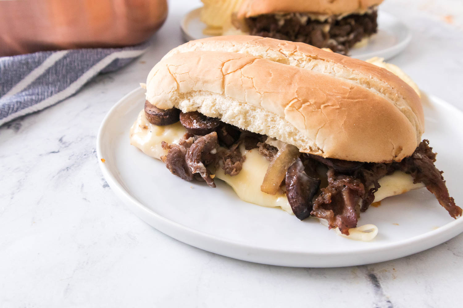 There's nothing quite like a Philly cheesesteak. Thin slices of steak, melted cheese, and onions grilled to perfection on a fresh roll- it doesn't get much better than that. And while you can find variations of this sandwich all over the country, there's really nothing quite like the real thing from Philadelphia.