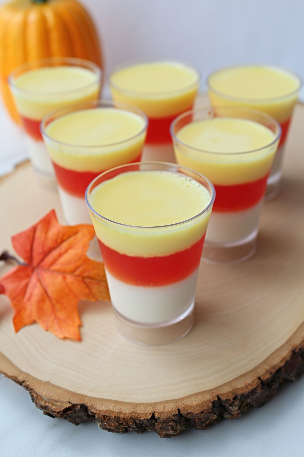 Fun, incredibly easy, and delicious; these candy corn Jello shots with Vodka make a tasty treat for your next Halloween. Not to mention that it's a hit with kids (be sure to skip the alcohol) and grown-ups (hello, Vodka jello shots!).
