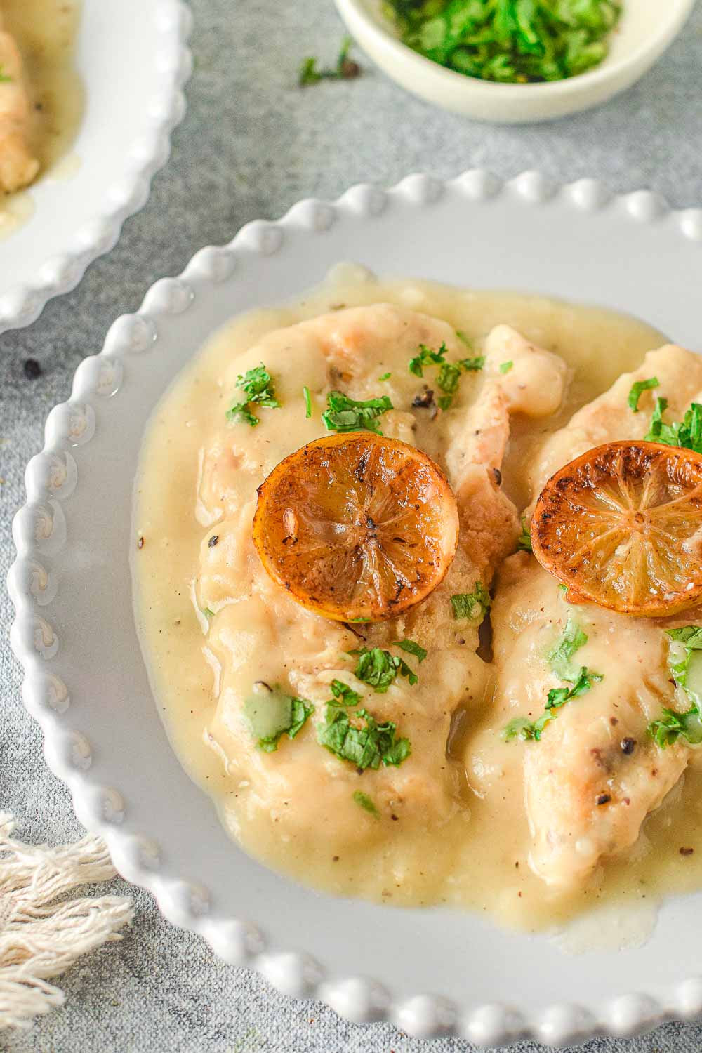 This super-easy 30-minute chicken Francaise recipe has just the right amount of lemon flavor, white wine, and butter. Add it to your dinner rotation!