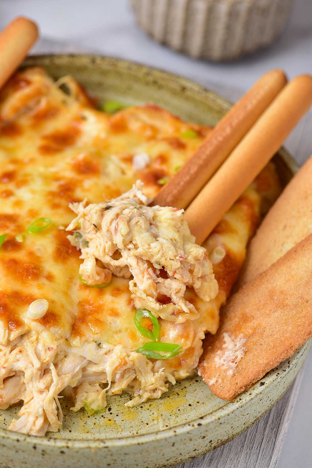 If you’d like to have Easy Baked Buffalo Chicken Dip, this creamy dip recipe is for you! If you're a fan of buffalo sauce, you won't want to miss this one. Serve this no-hassle dip over air fryer chicken, steak quesadillas, or jalapeno poppers! 