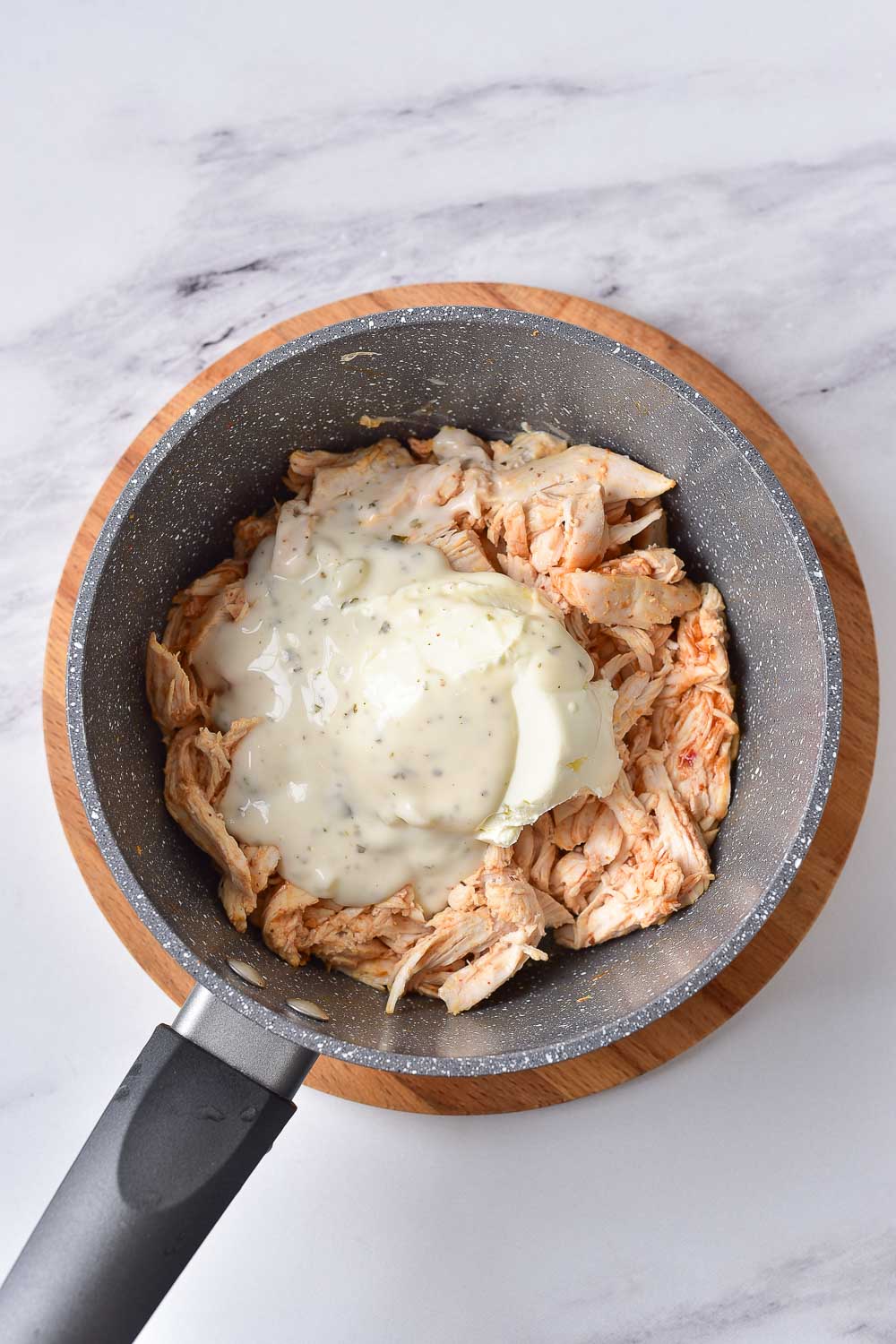 If you’d like to have Easy Baked Buffalo Chicken Dip, this creamy dip recipe is for you! If you're a fan of buffalo sauce, you won't want to miss this one. Serve this no-hassle dip over air fryer chicken, steak quesadillas, or jalapeno poppers! 