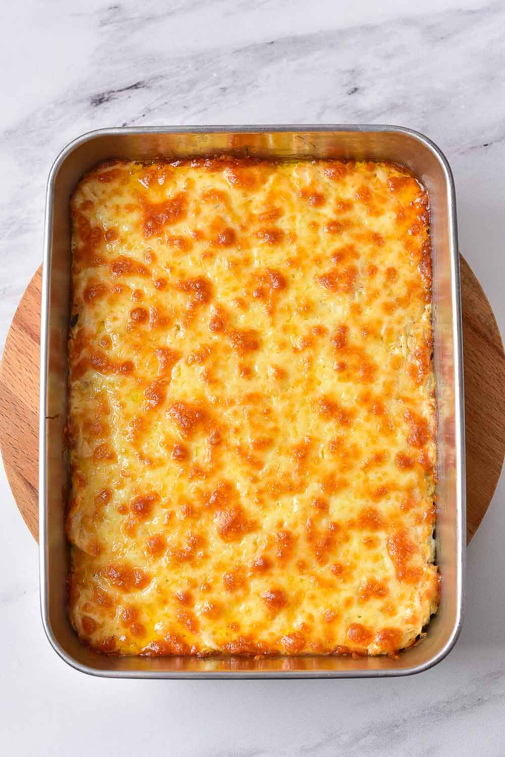 If you’d like to have Easy Baked Buffalo Chicken Dip, this creamy dip recipe is for you! If you're a fan of buffalo sauce, you won't want to miss this one. Serve this no-hassle dip over air fryer chicken, steak quesadillas, or jalapeno poppers! 