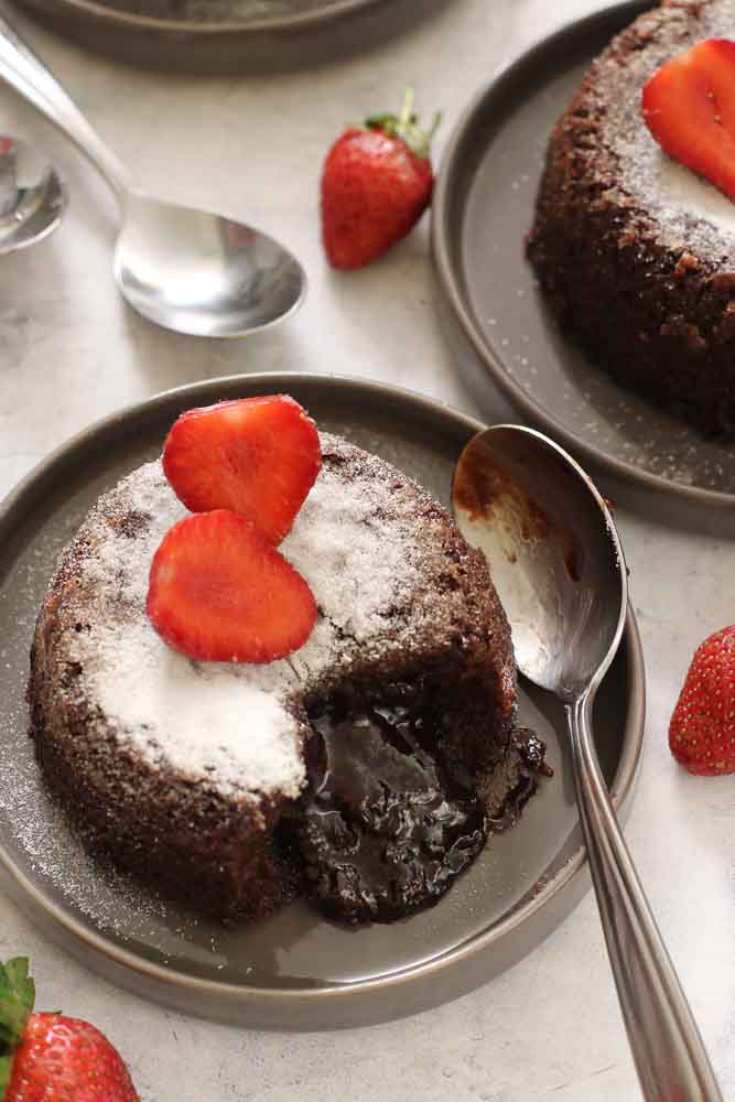 This quick and easy chocolate hazelnut lava cake recipe is a chocolate lover’s dream! It is a rich chocolate dessert with a gooey oozing center!