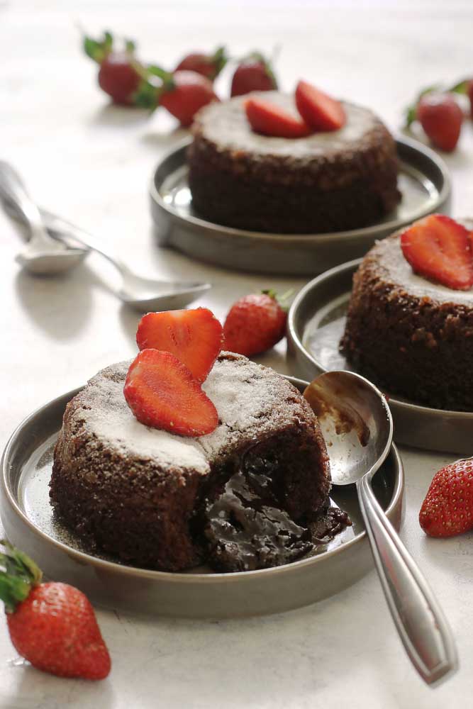 This quick and easy chocolate hazelnut lava cake recipe is a chocolate lover’s dream! It is a rich chocolate dessert with a gooey oozing center!