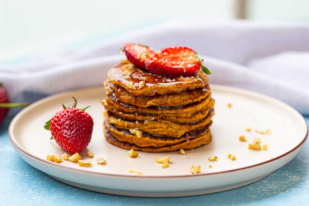 After trying these thick and fluffy sweet potato pancakes, you will fly out of bed in the morning. It's a hearty and comforting breakfast, all in one bite!