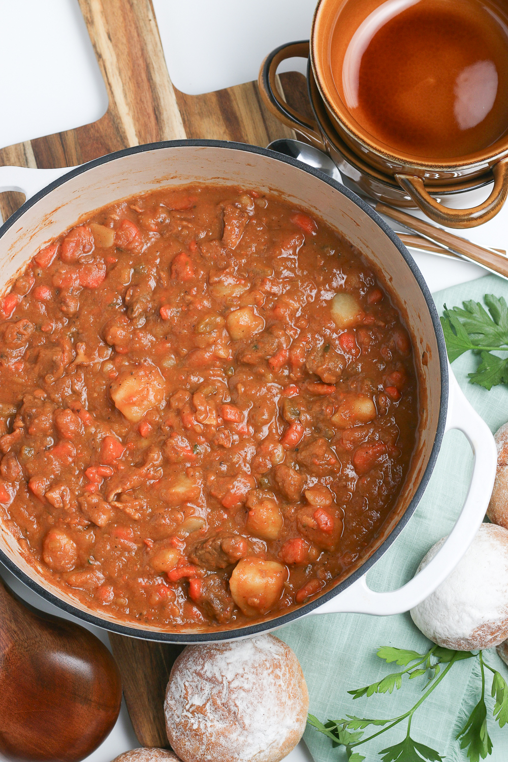 This hearty Guinness Beef Stew is filled with tender vegetables and melt-in-your-mouth beef in a rich and flavorful tomato beef broth. Learn how to make this Irish stew three ways - Stove top, Instant Pot, and slow cooker.