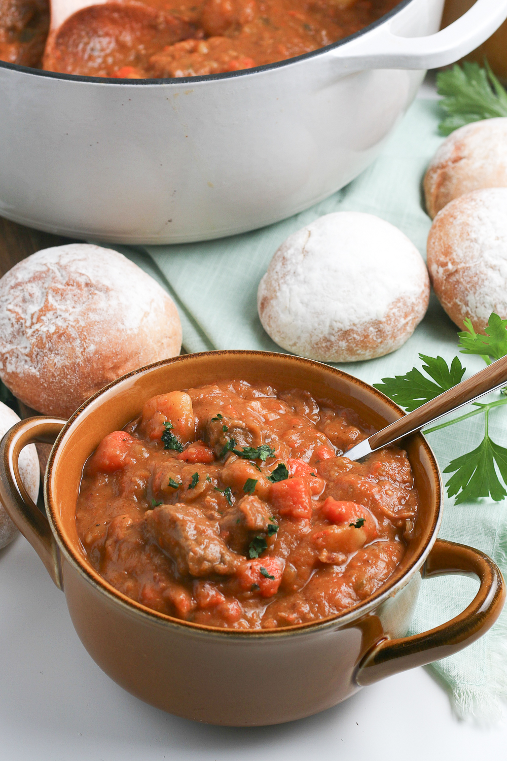 This hearty Guinness Beef Stew is filled with tender vegetables and melt-in-your-mouth beef in a rich and flavorful tomato beef broth. Learn how to make this Irish stew three ways - Stove top, Instant Pot, and slow cooker.