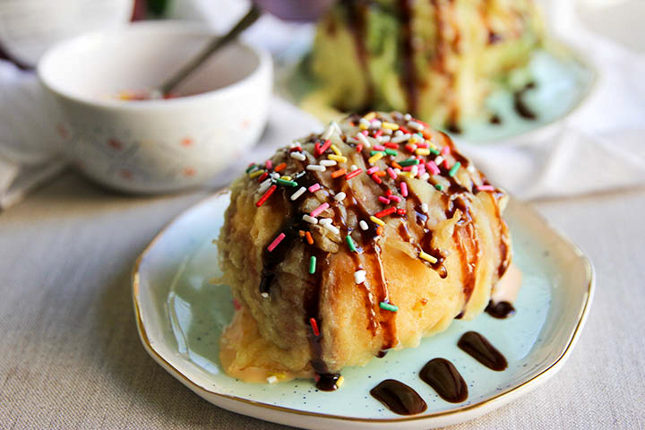 Tempura fried ice cream ball with golden crust and creamy center