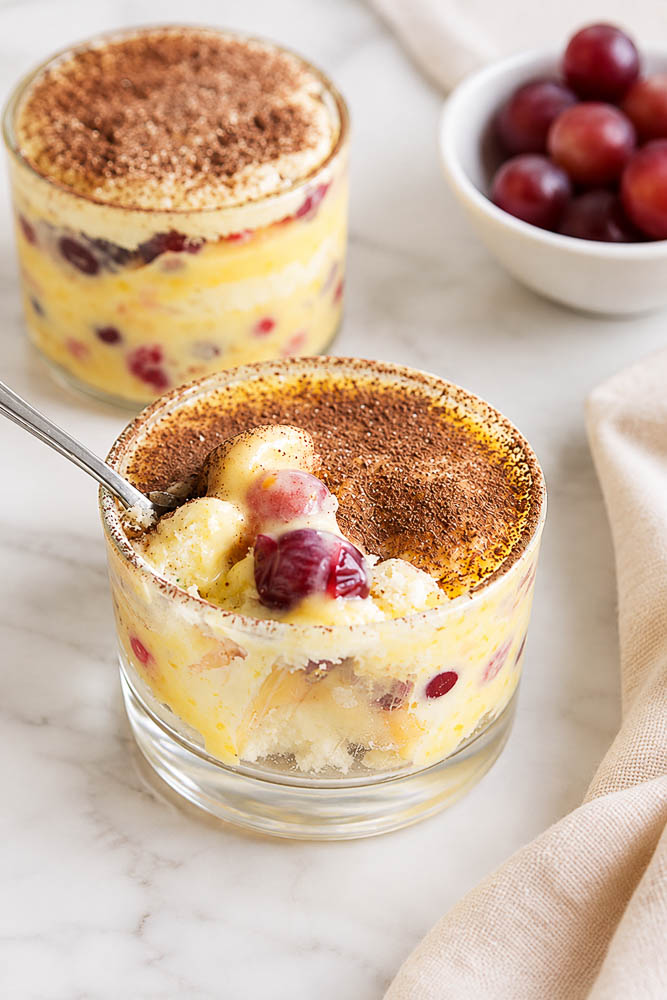 This Cranberry Tiramisu layers soft amaretto-brushed ladyfingers with creamy mascarpone custard and a bright, tangy cranberry sauce for an elegant twist on classic tiramisu.