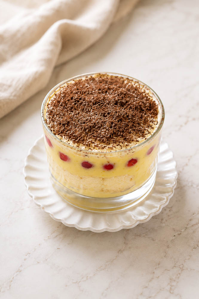 This Cranberry Tiramisu layers soft amaretto-brushed ladyfingers with creamy mascarpone custard and a bright, tangy cranberry sauce for an elegant twist on classic tiramisu.