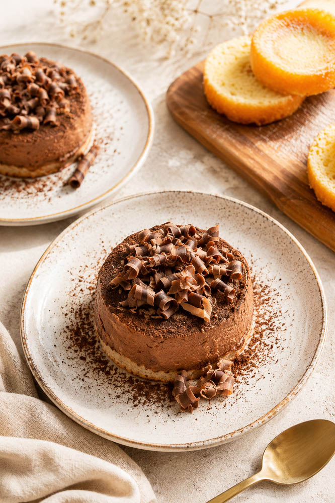 This Double Chocolate Pumpkin Tiramisu combines creamy pumpkin mascarpone with dark chocolate, coffee, Kahlúa, and cocoa for a rich but surprisingly light fall dessert.