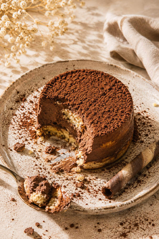 This Double Chocolate Pumpkin Tiramisu combines creamy pumpkin mascarpone with dark chocolate, coffee, Kahlúa, and cocoa for a rich but surprisingly light fall dessert.