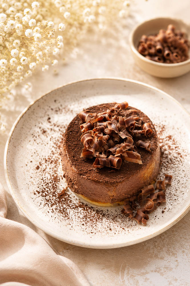 This Double Chocolate Pumpkin Tiramisu combines creamy pumpkin mascarpone with dark chocolate, coffee, Kahlúa, and cocoa for a rich but surprisingly light fall dessert.