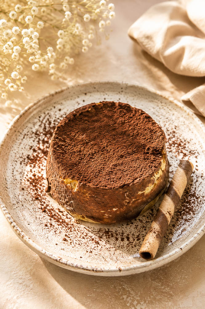 This Double Chocolate Pumpkin Tiramisu combines creamy pumpkin mascarpone with dark chocolate, coffee, Kahlúa, and cocoa for a rich but surprisingly light fall dessert.
