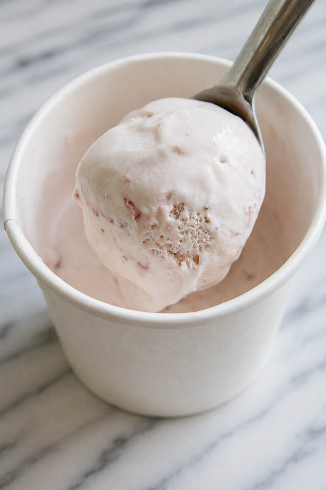 This homemade strawberry ice cream is rich, creamy, and packed with fresh strawberries.